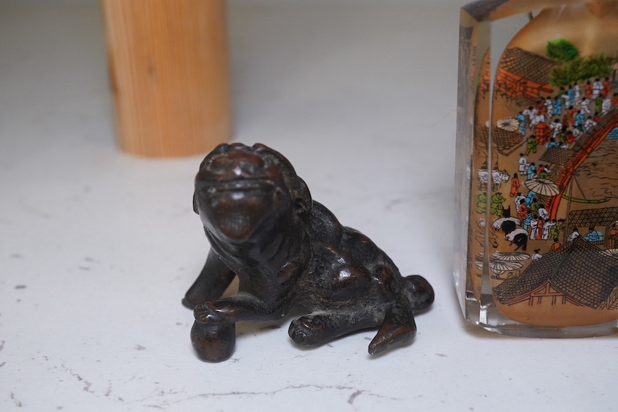 A Japanese bronze koro and cover, 23.5cm high, together with a inside painted glass snuff bottle, 8.5cm high. Condition - fair, dog detached from cover of koro, etc.